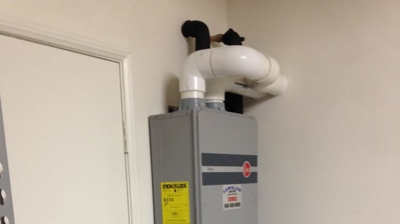 Rheem Condensing Tankless Water Heater 94% efficient in Aliso Viejo Photo